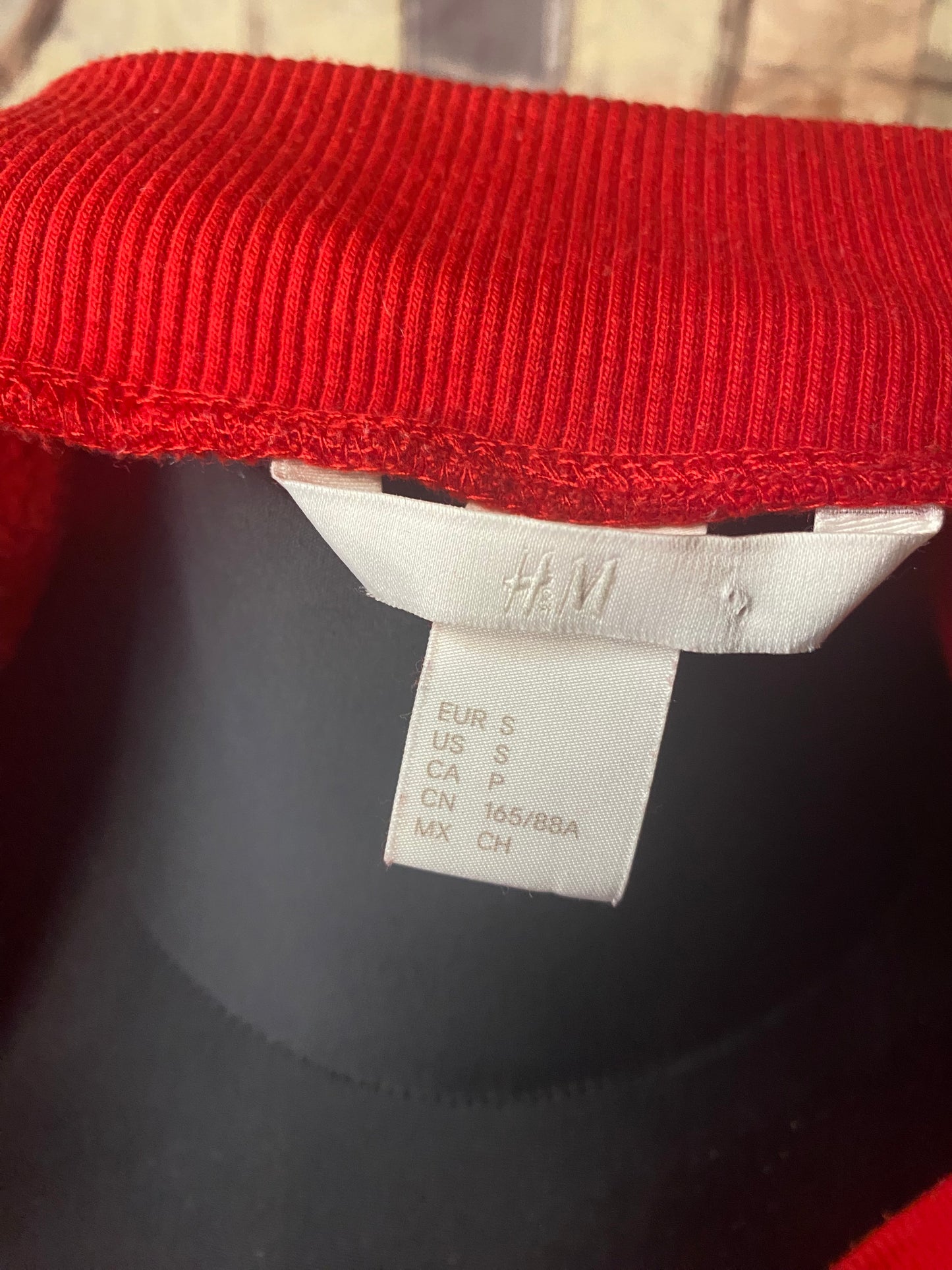 Red off-shoulder sweater