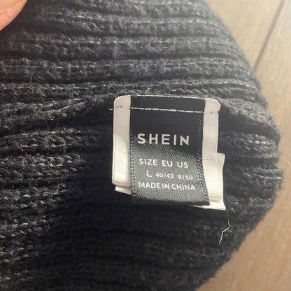 Black cutout turtleneck sweatshirt