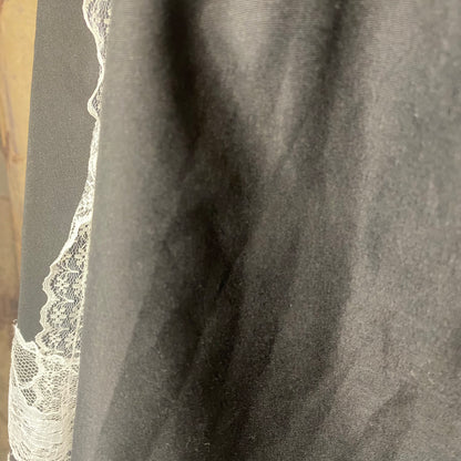 Black skirt with white lace details