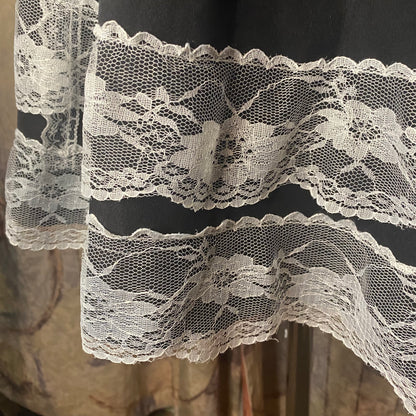 Black skirt with white lace details