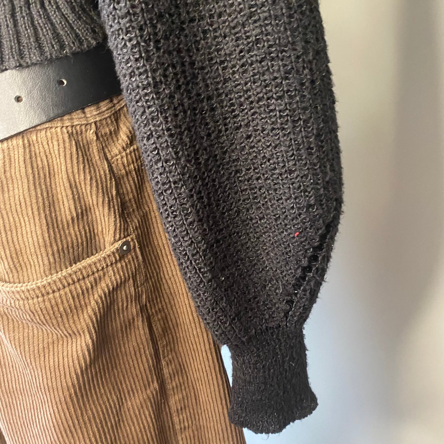 Black cutout turtleneck sweatshirt