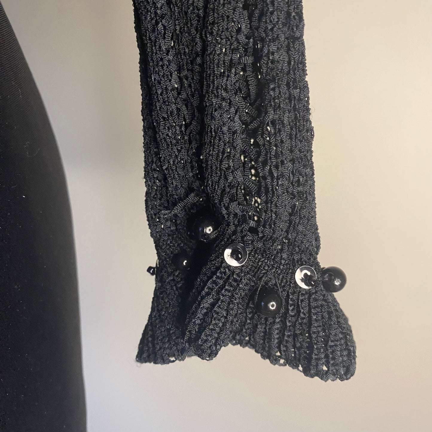 Black knit bolero with details