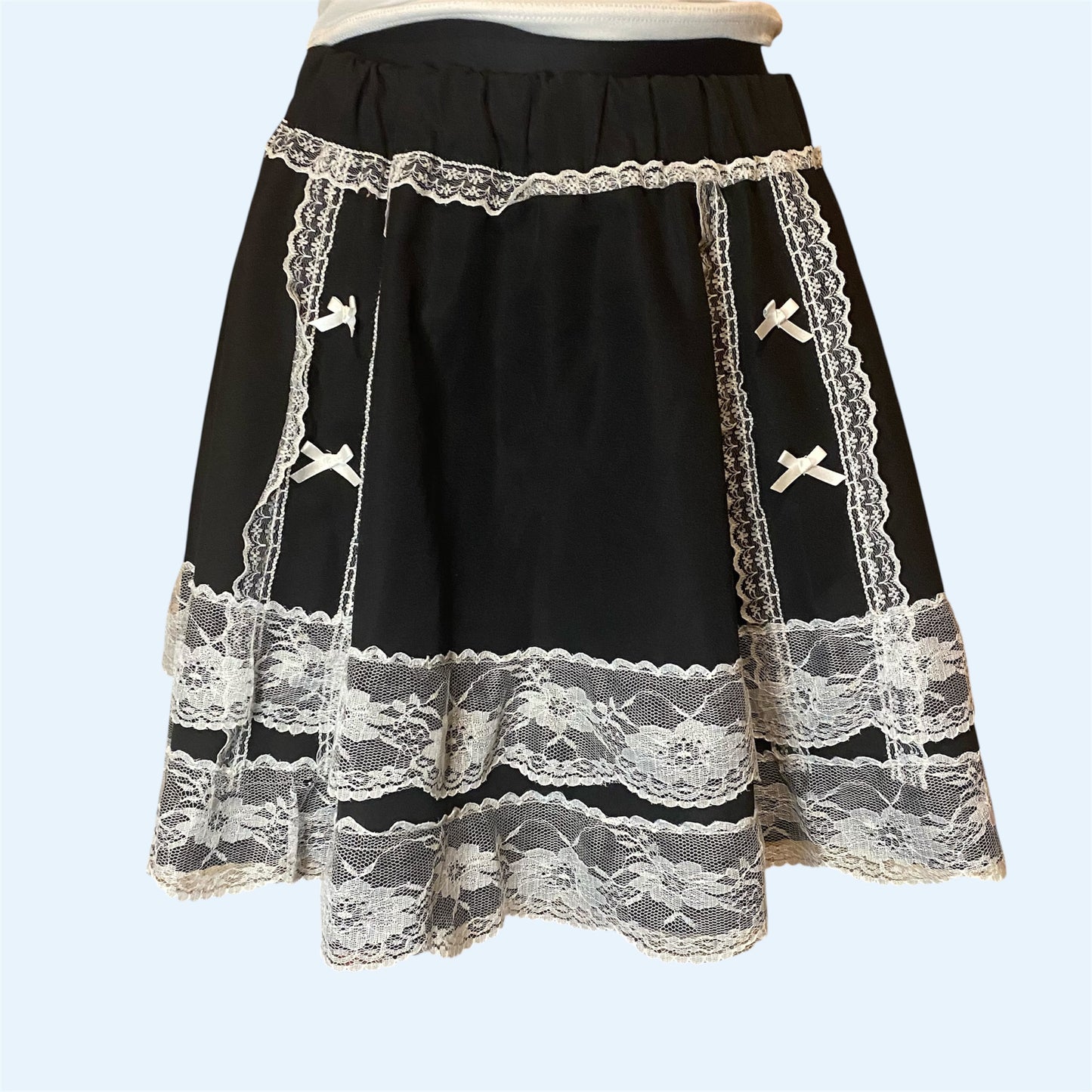 Black skirt with white lace details